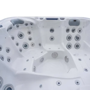 Sedute ergonomiche e getti idromassaggio della spa JJSPA Beta 523, acrilico marmo bianco.