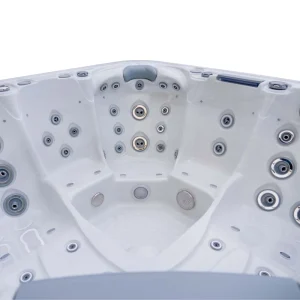 Interno della vasca idromassaggio JJSPA Beta 523 in acrilico marmo bianco con getti idromassaggio.