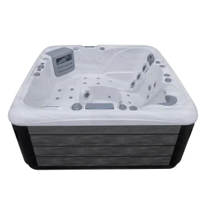 Vasca idromassaggio da esterno JJSPA Beta 523 in acrilico marmo bianco e rivestimento in legno grigio.